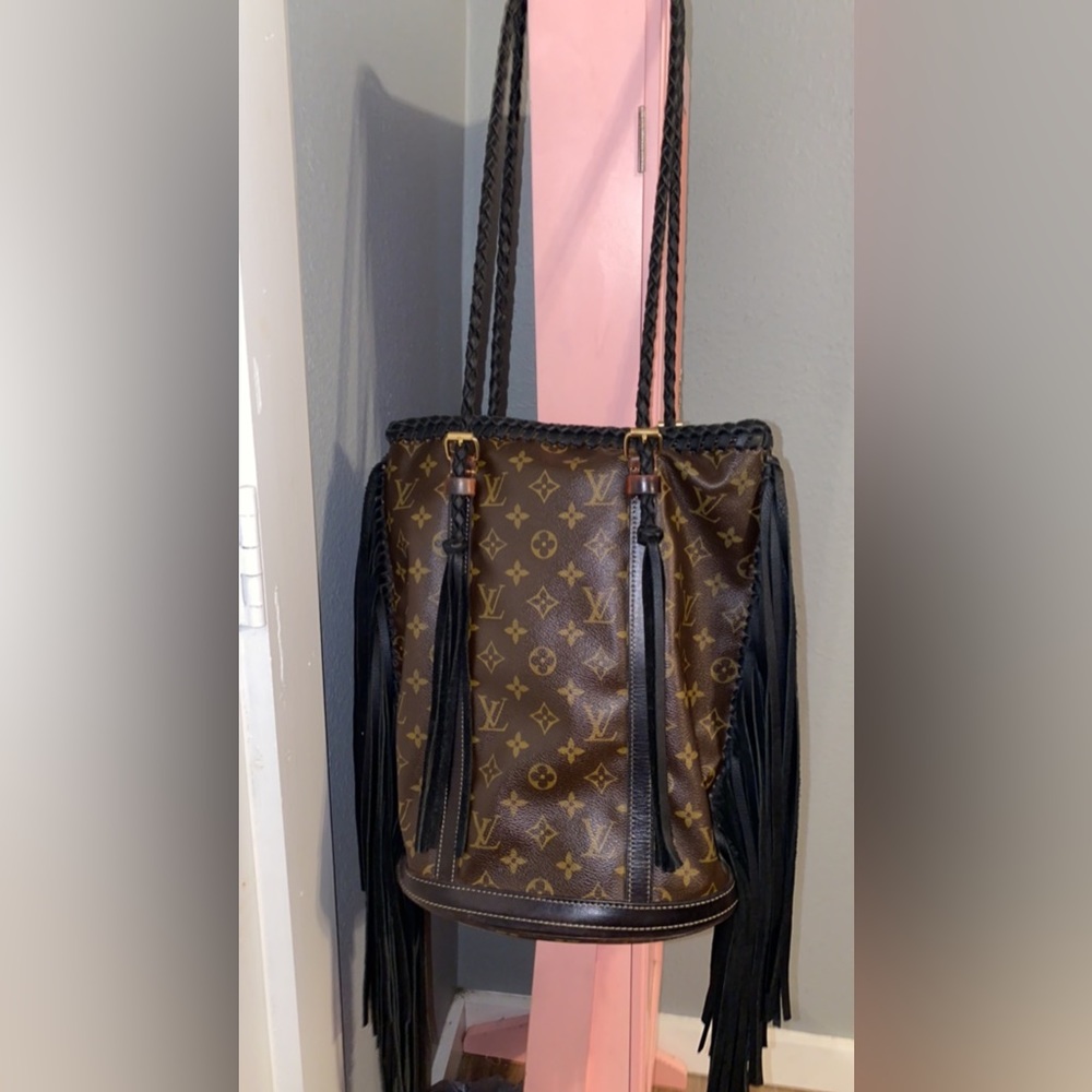 Refurbished fringe Louis Vuitton